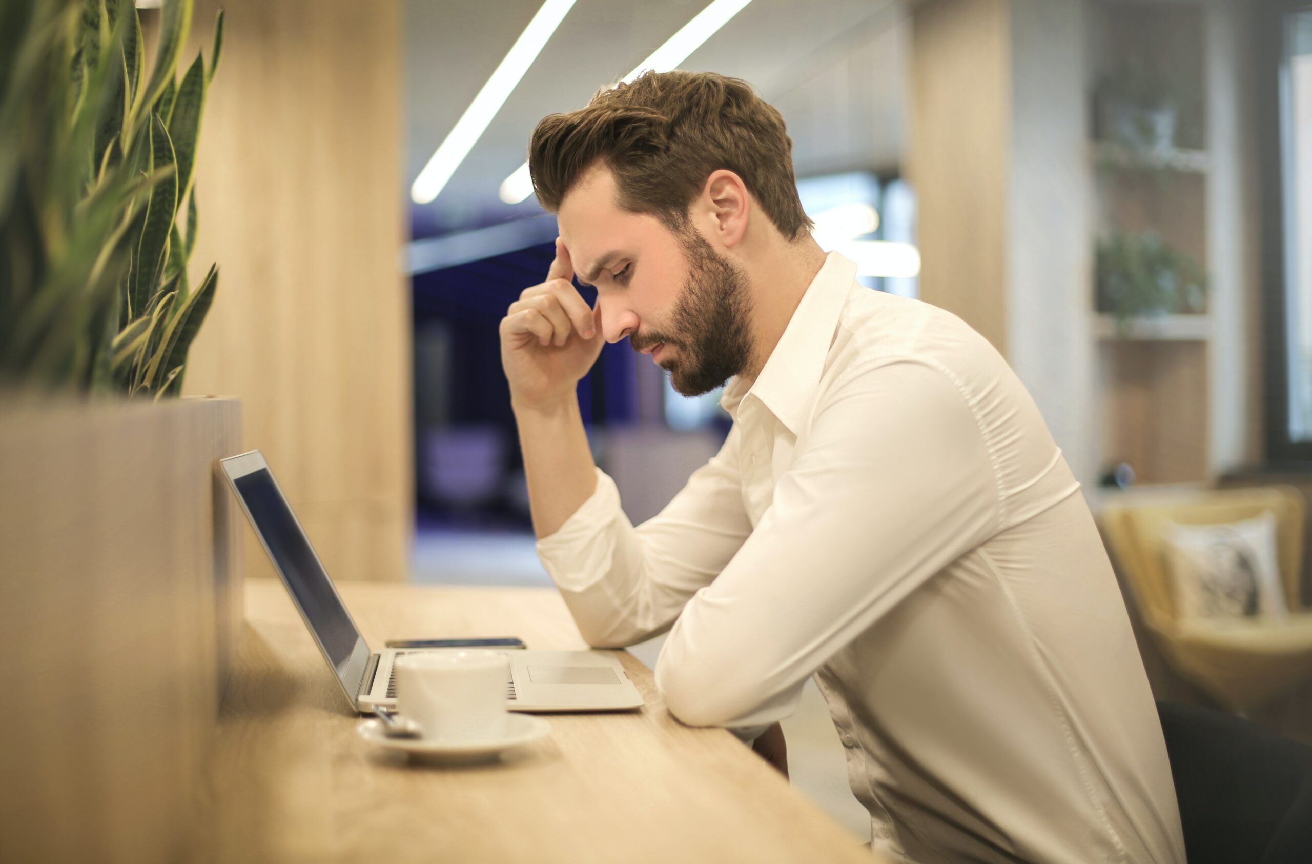 man-seriously-staring-at-laptop