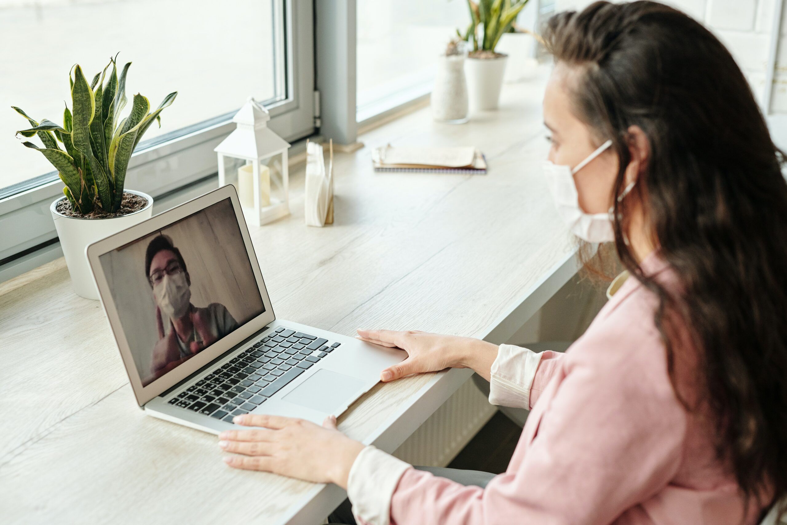 people-having-online-meeting-while-wearing-mask